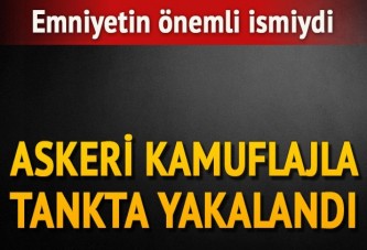 Emniyet müdürü askeri kamuflajla yakalandı