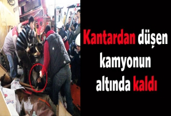 Kantardan düşen kamyonun altında kaldı