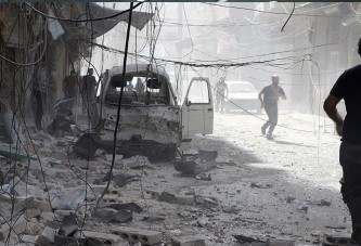 Suriye'de varil ve vakum bombalı saldırı: 28 ölü