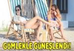 Gömlekle güneşlendi