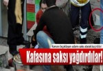 Karısını bıçaklayan adamı saksı atarak kaçırdılar