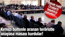 Kırmızı bültenle aranan teröristle anayasa masası kurdular! Bebek katili Öcalan'lı teşekkür plaketleri...