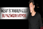 Mesut Özil imzayı atıyor