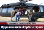 Oy pusulaları helikopterle taşındı