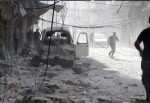 Suriye'de varil ve vakum bombalı saldırı: 28 ölü