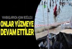 Yanlarındaki adam boğuldu, onlar yüzmeye devam etti